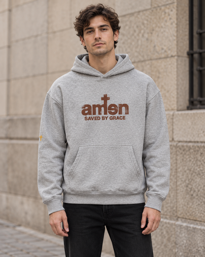 Styling-Mockup: grauer Amen Hoodie mit Saved-by-Grace-Print, getragen mit schwarzer Jeans