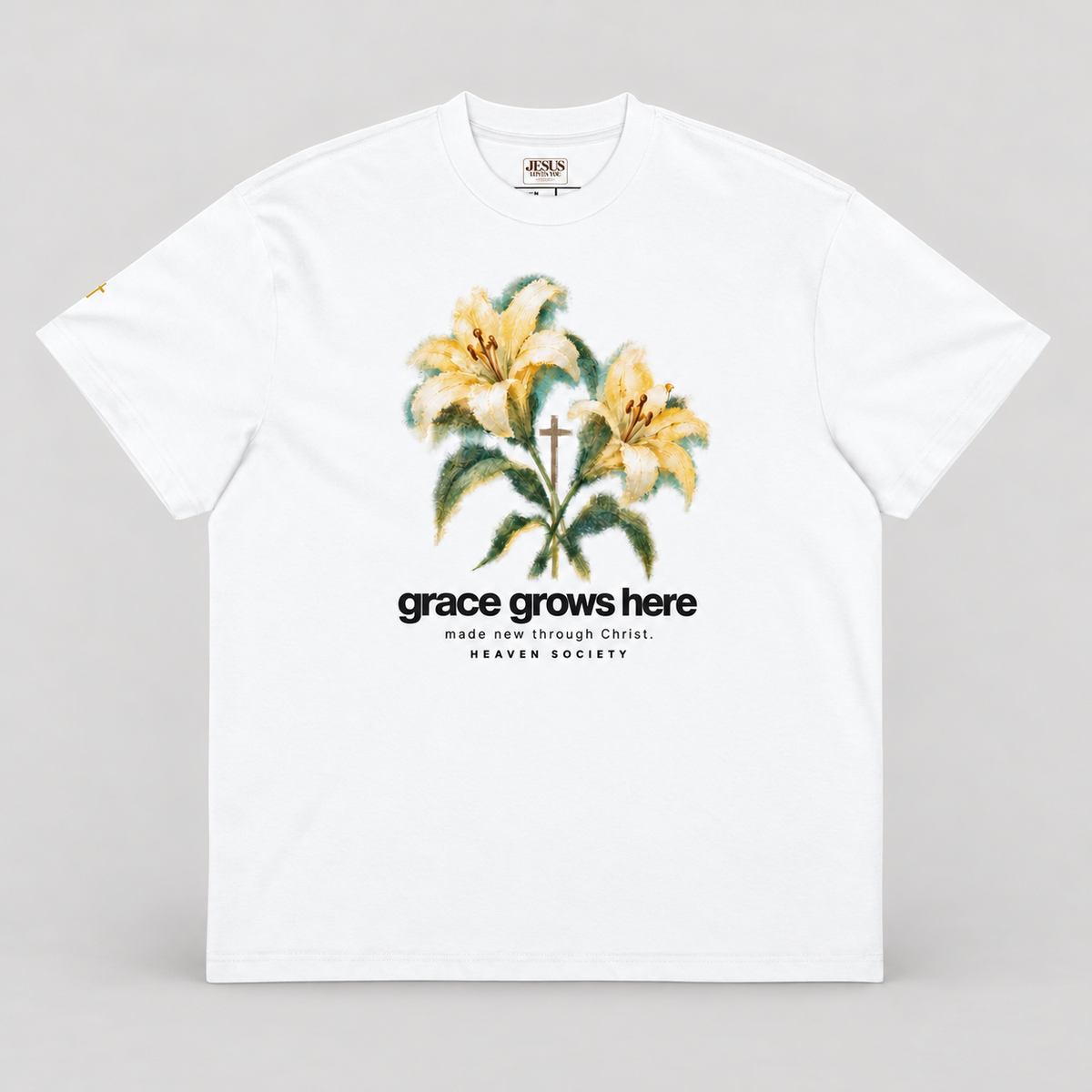 Grace Grows Here Boxy T-Shirt in White on a warm grey studio background
